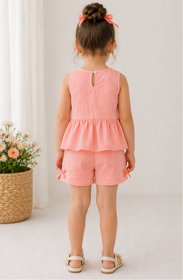 Girls pink-and-white striped peplum top with keyhole back and matching shorts with ties