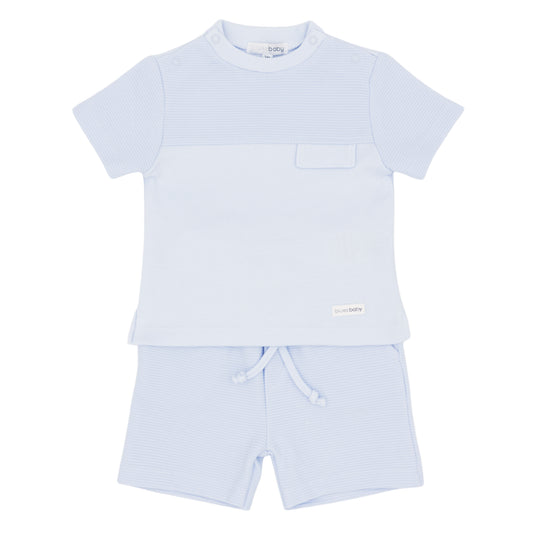 Light blue children's t-shirt and shorts set on a white background