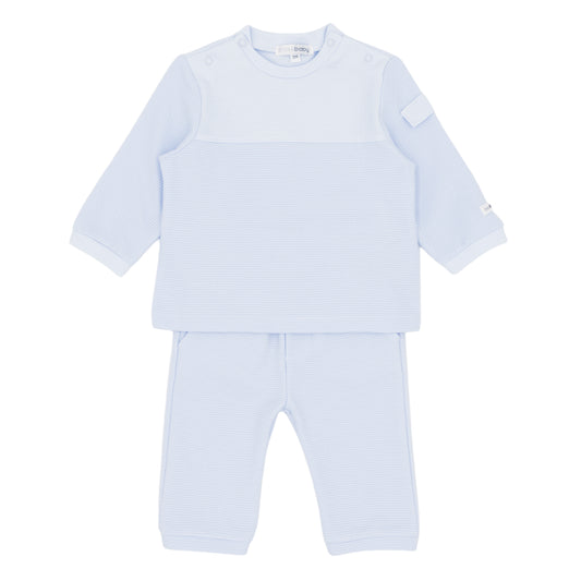Light blue baby outfit with shirt and pants on a white background