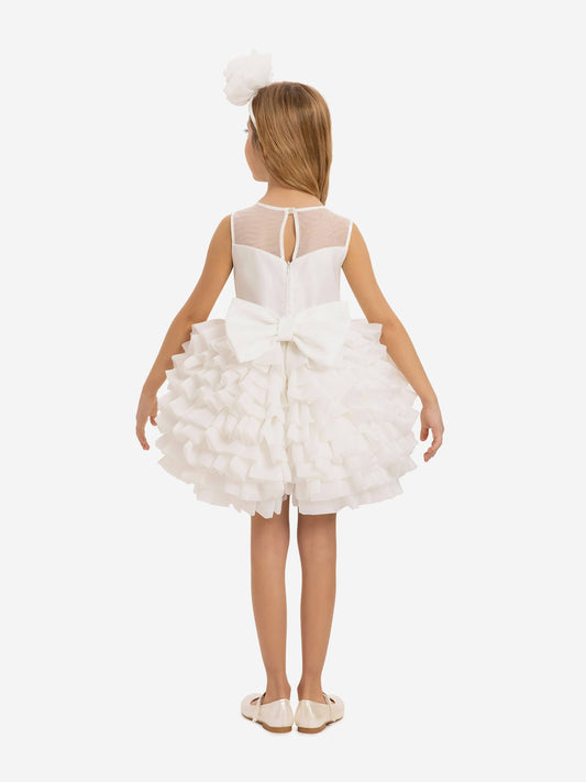 Back view girls white dress with layered tulle skirt, ribbon bow detail, plus matching headband
