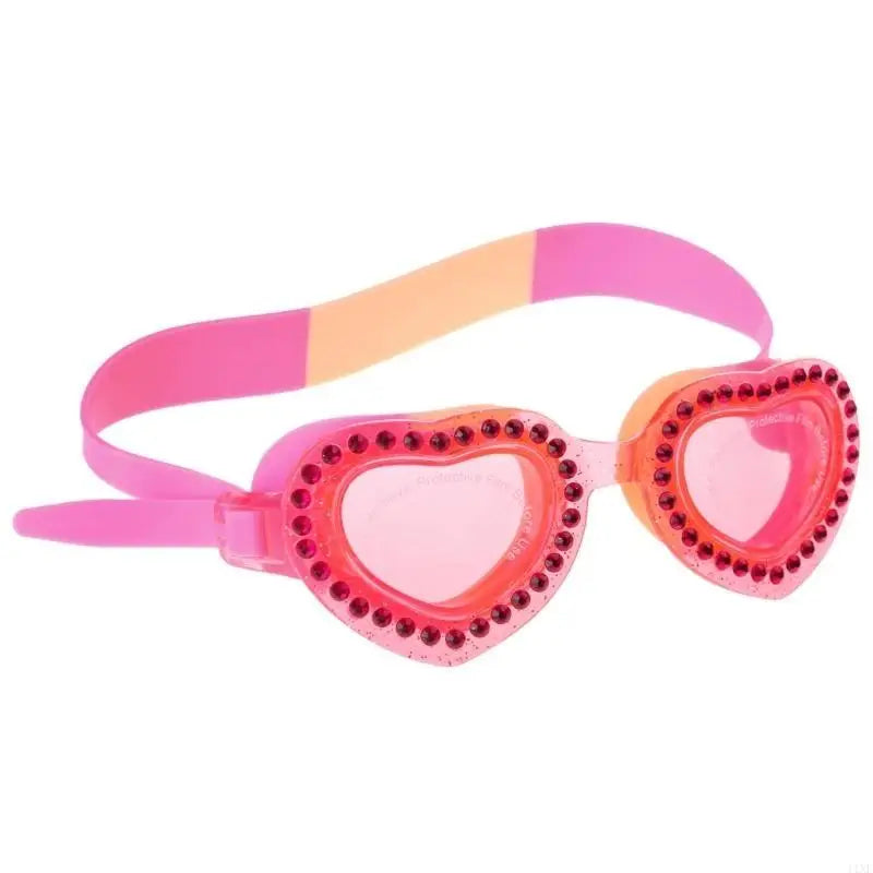 Girls' fun swimming goggles in pink with red heart lenses and red stud trim
