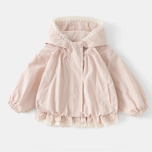 Pink baby jacket with lace details on a white background