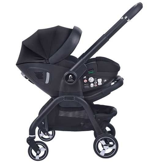 Black stroller with infant car seat, visible harness and control panel