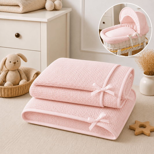Pink waffle moses basket bedding set: rolled quilt and bumper with bows