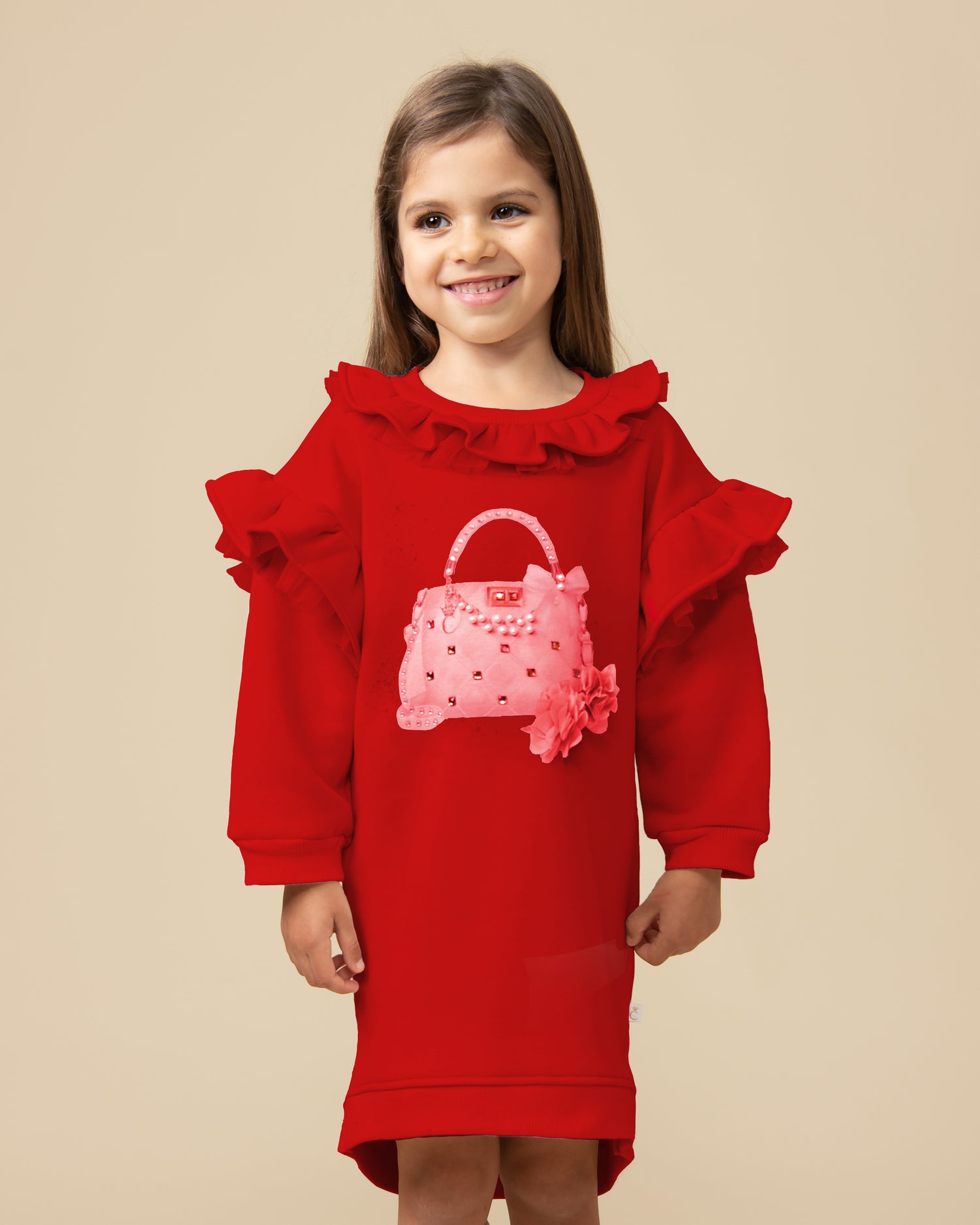 Red girls’ dress with ruffled neckline, long sleeves, pink handbag appliqué