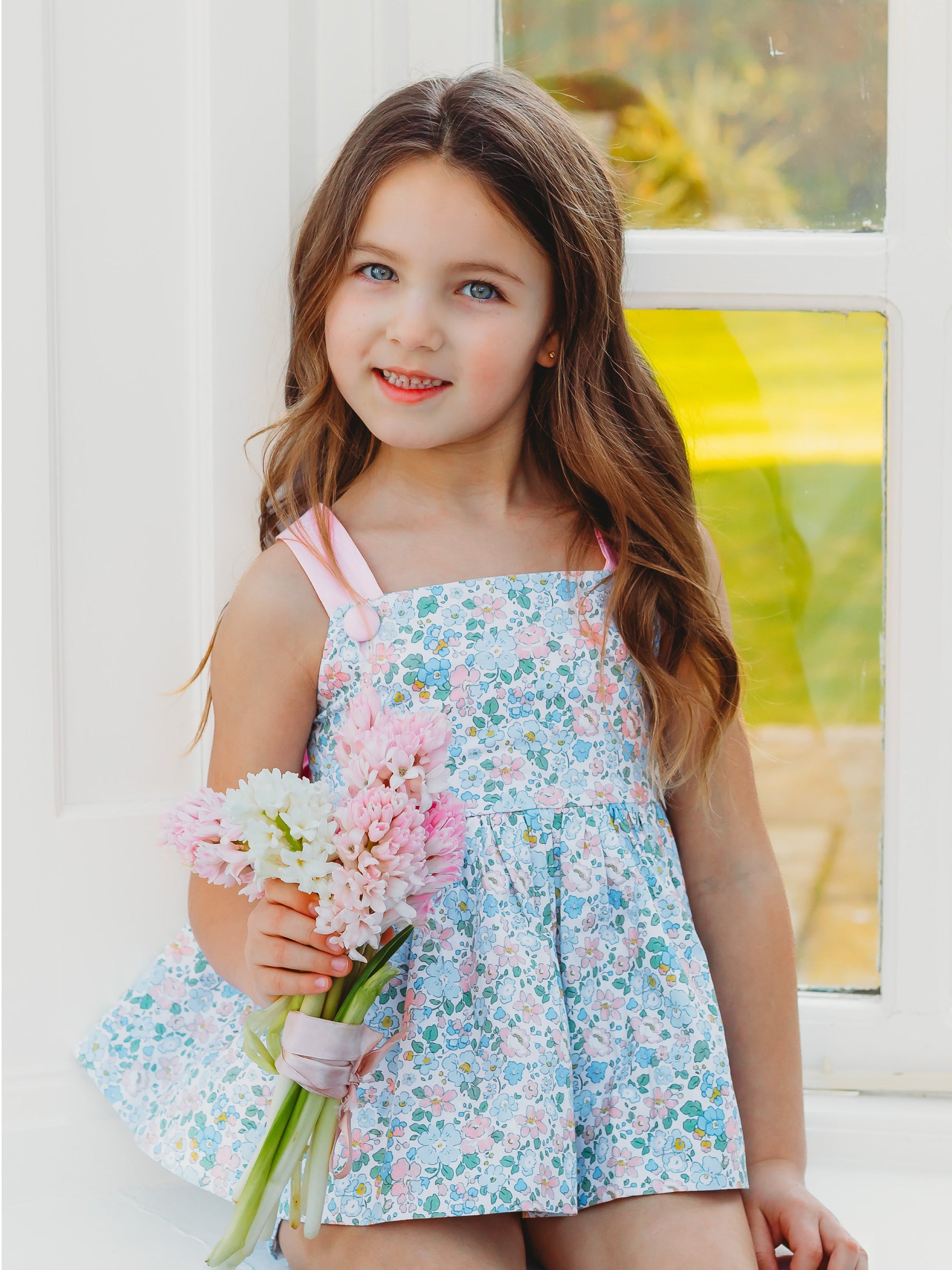 Floral bow-back bloomer set in light blue with pink ribbon bow and gathered skirt