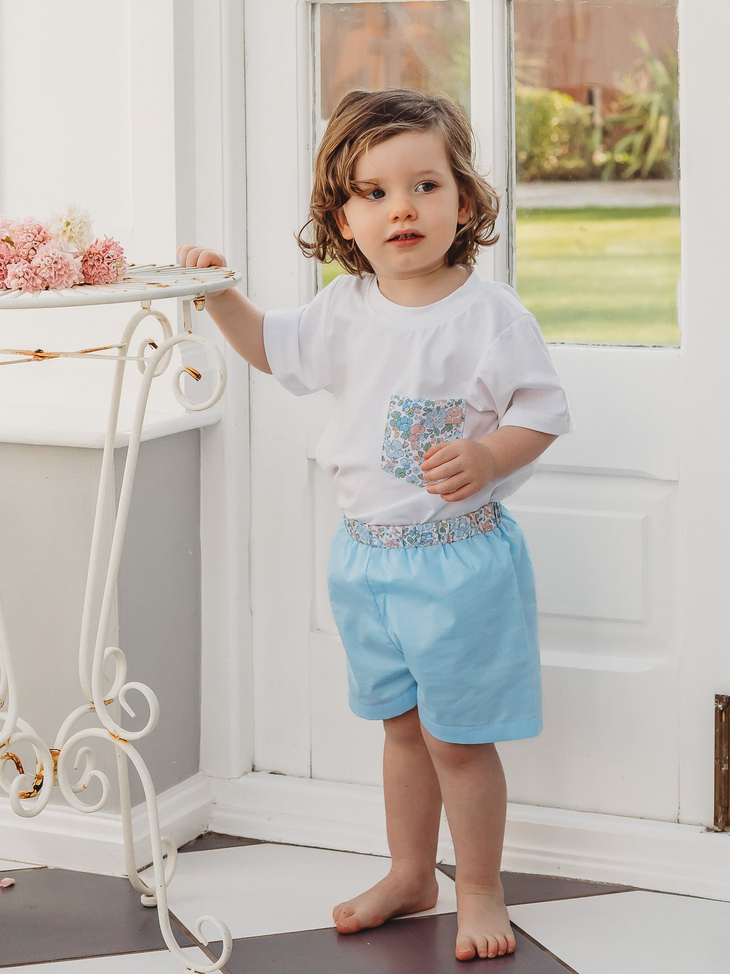 Light blue R&A 'Betsy' boys swimshort, elastic waist and above-knee cut