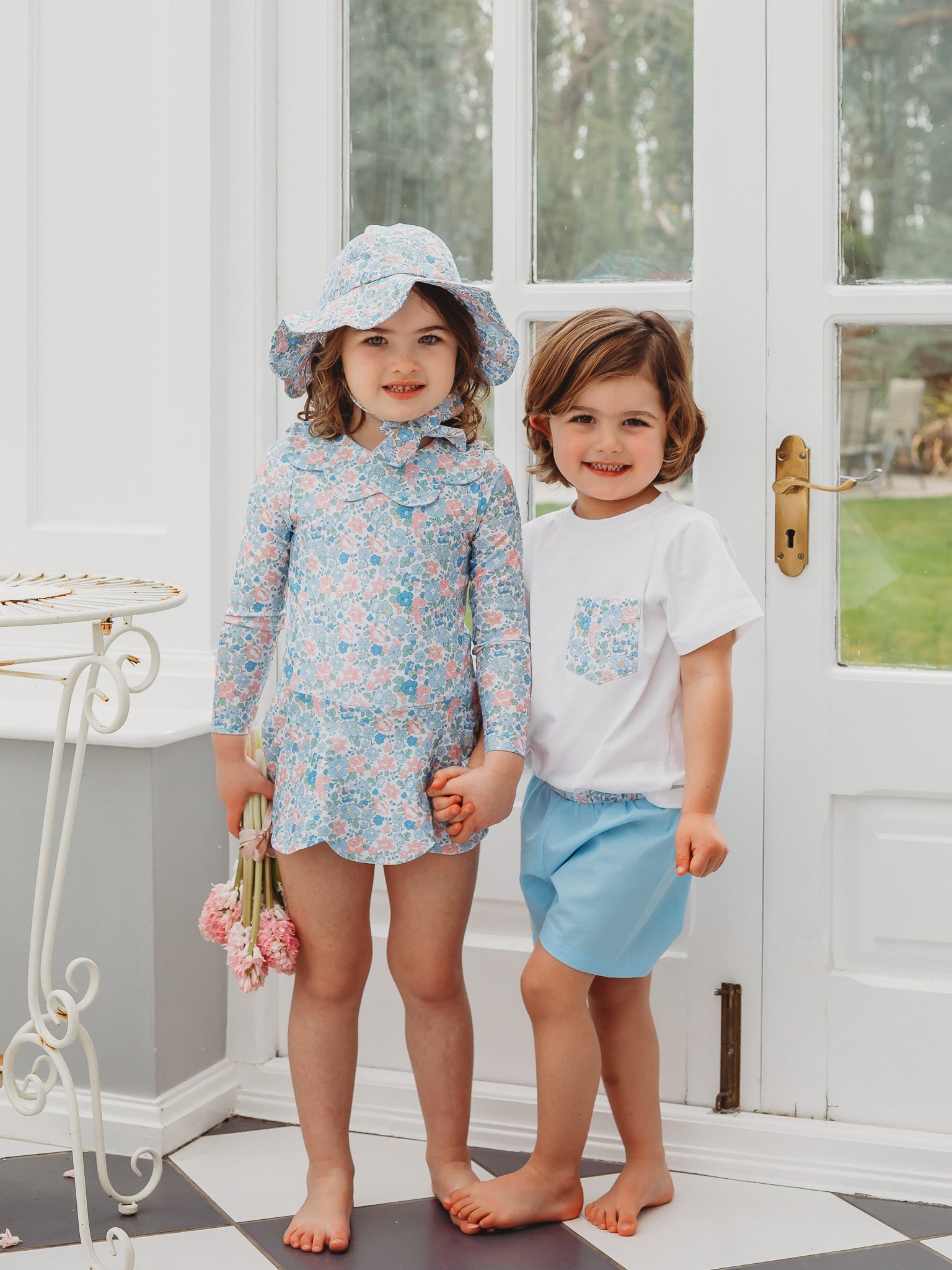 Floral petal-collar long-sleeve skirted swimsuit, light blue, bucket hat