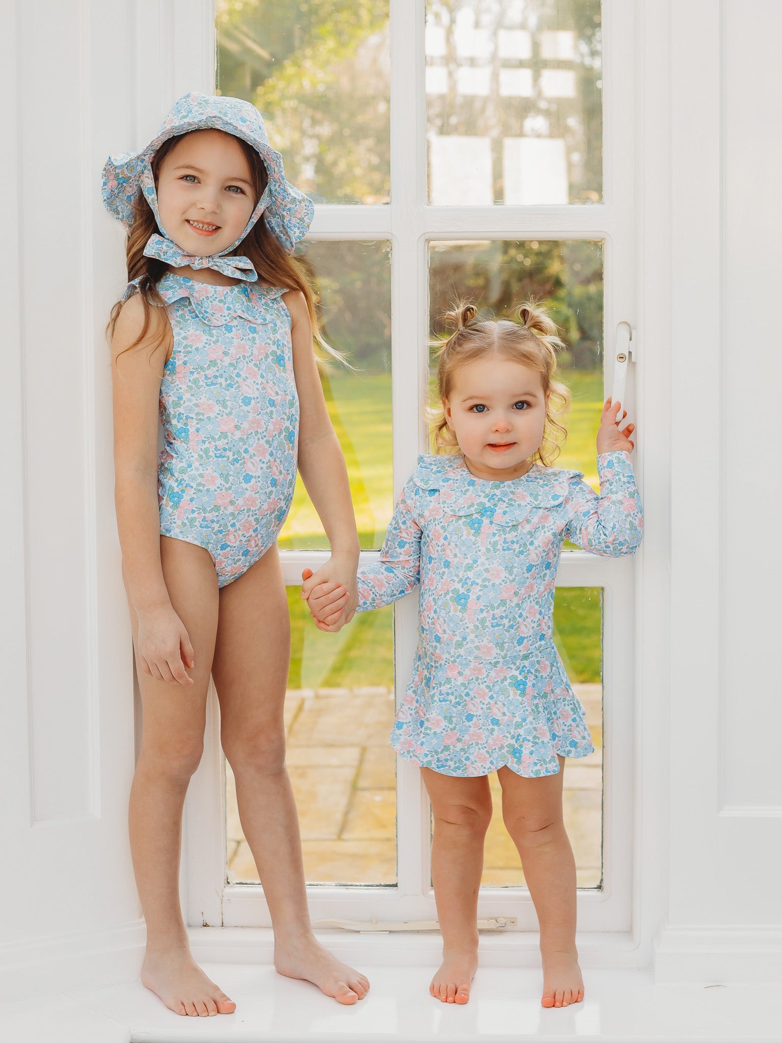 Floral light blue petal sunhat with wide brim and matching one-piece outfit
