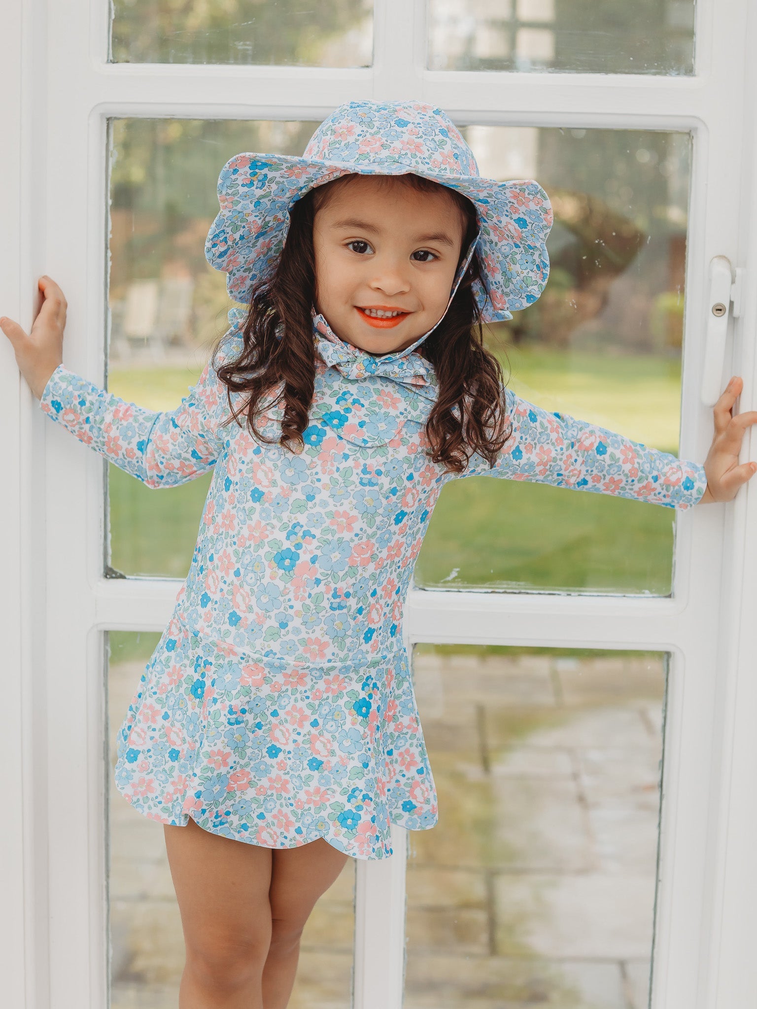 Floral petal-collar long-sleeve skirted swimsuit with matching bucket hat, light blue