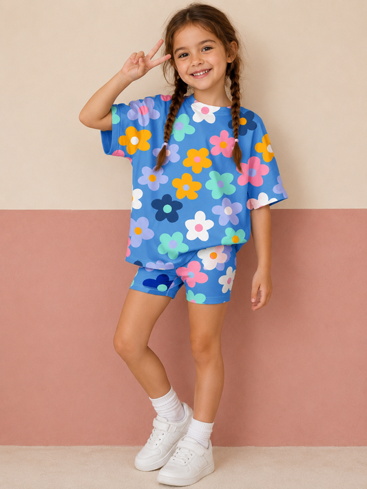 Kids lounge set in blue with colorful flower print: short-sleeve top & shorts