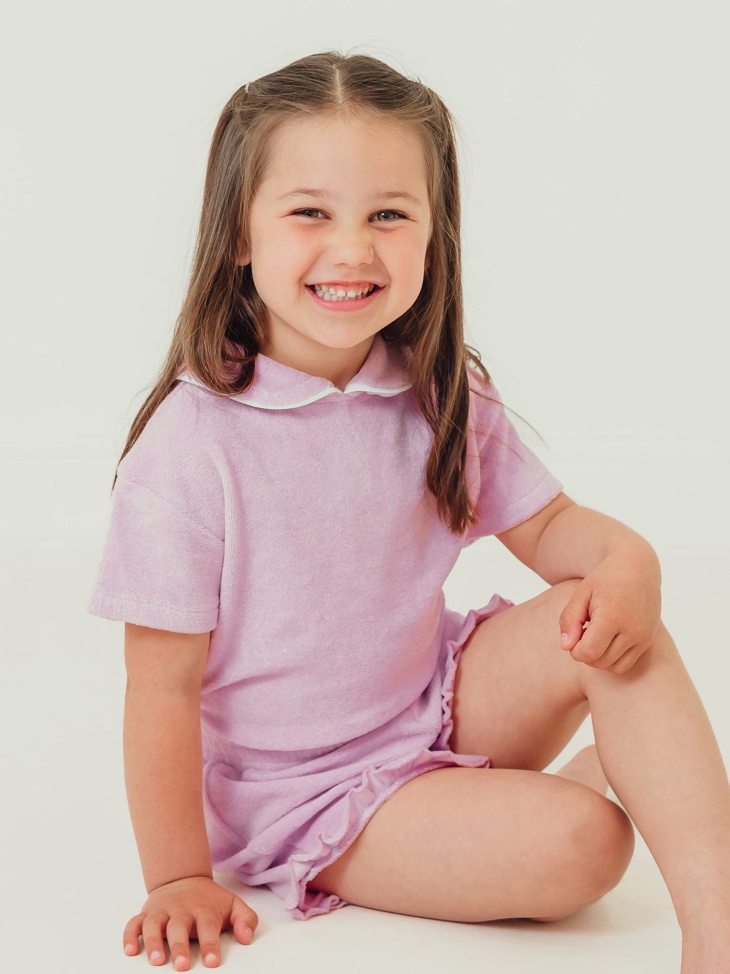 Lilac towelling short set with frilled collar and matching ruffle waist shorts