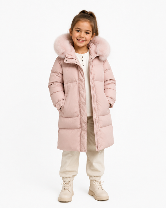 Girls' pink long puffer coat with faux fur hood trim, worn with knit pants