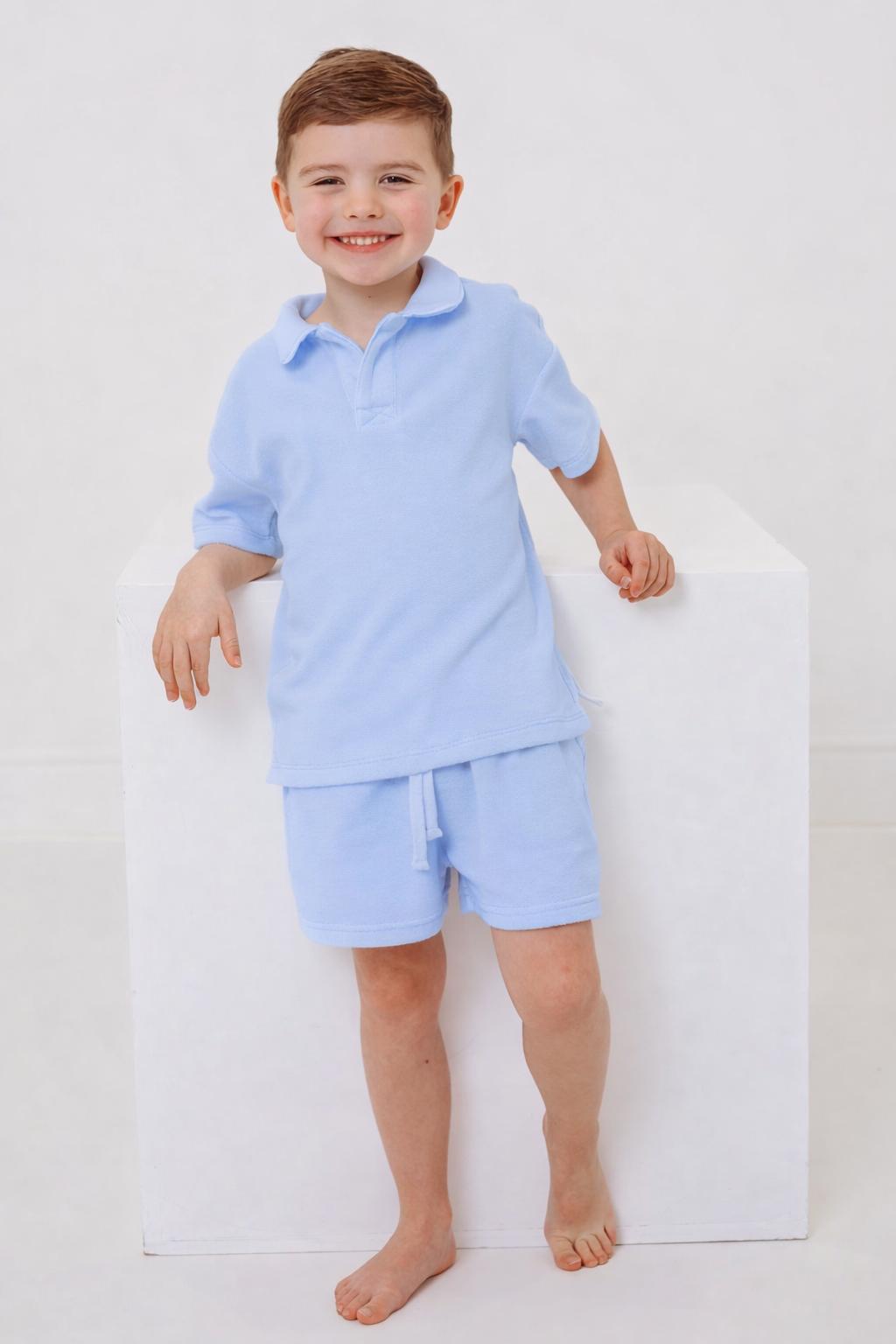 Blue towelling short set with polo collar T-shirt and matching drawstring shorts