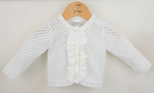 White baby cardigan on a wooden hanger against a plain background