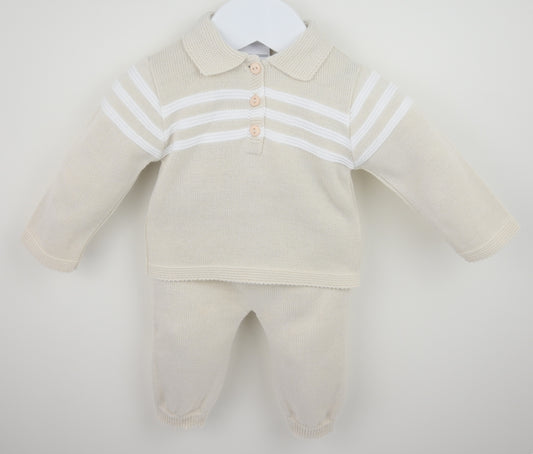 Beige baby outfit with a jacket and pants on a white background