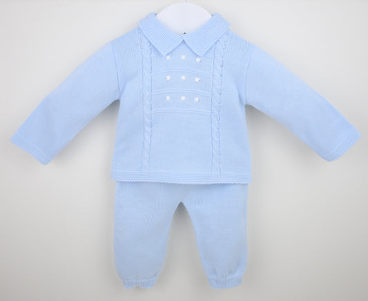Light blue baby outfit with shirt and pants on a white background