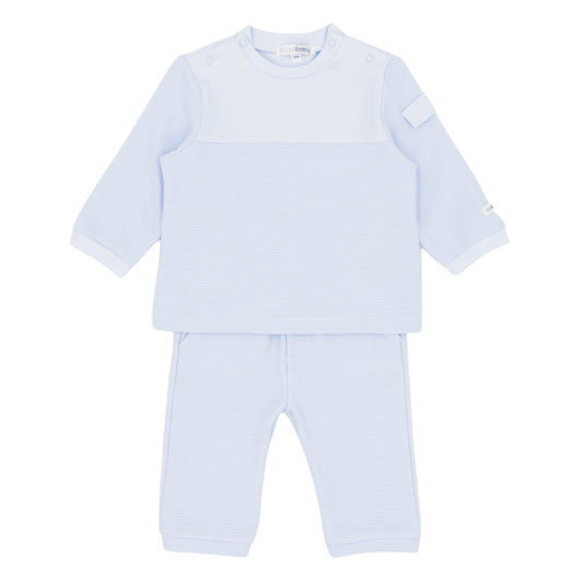 Light blue baby outfit with shirt and pants on a white background
