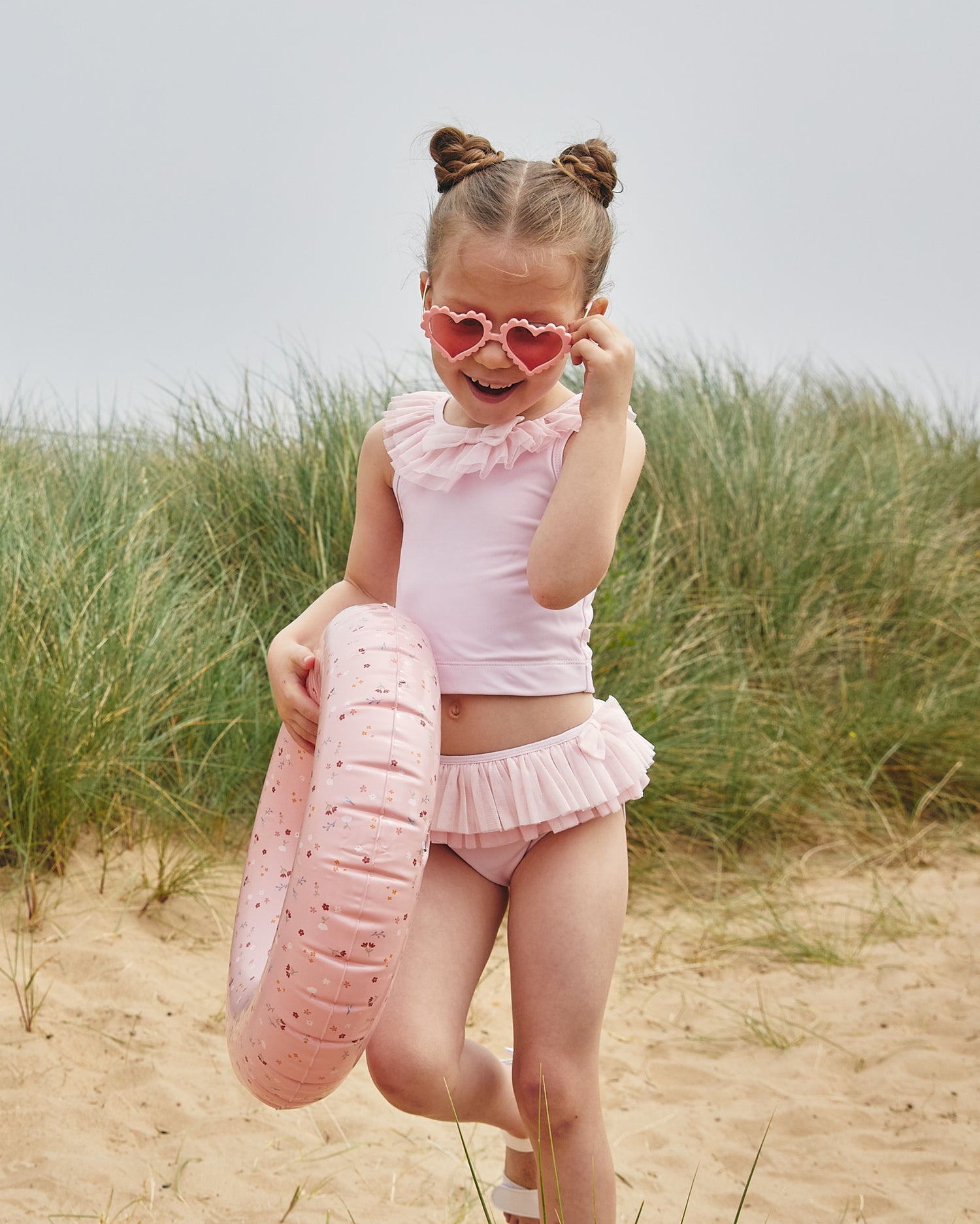 Pink girls tankini with ruffled tulle neckline and matching frill briefs