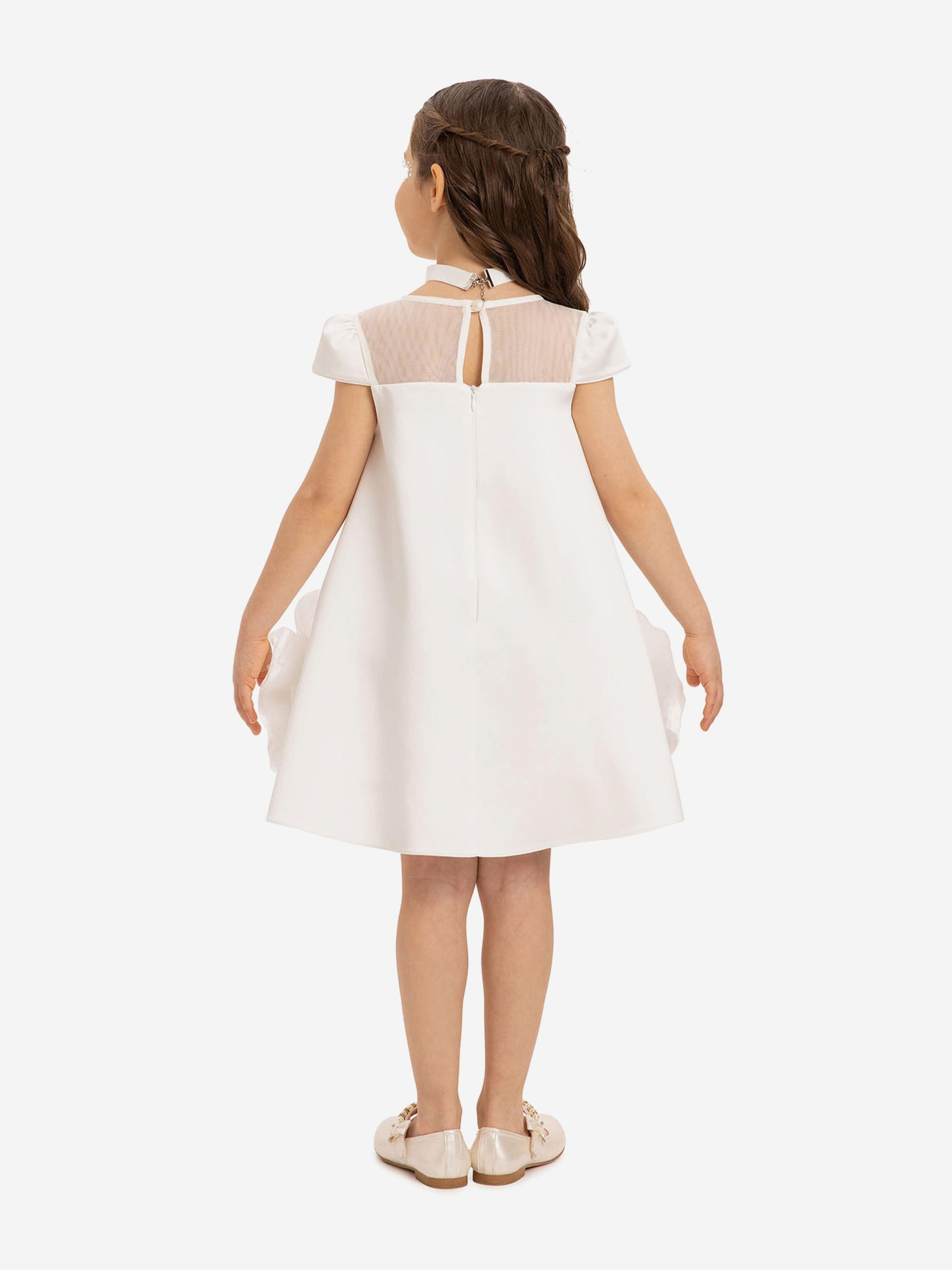 Back view: white girls dress with mesh yoke and vertical keyhole opening