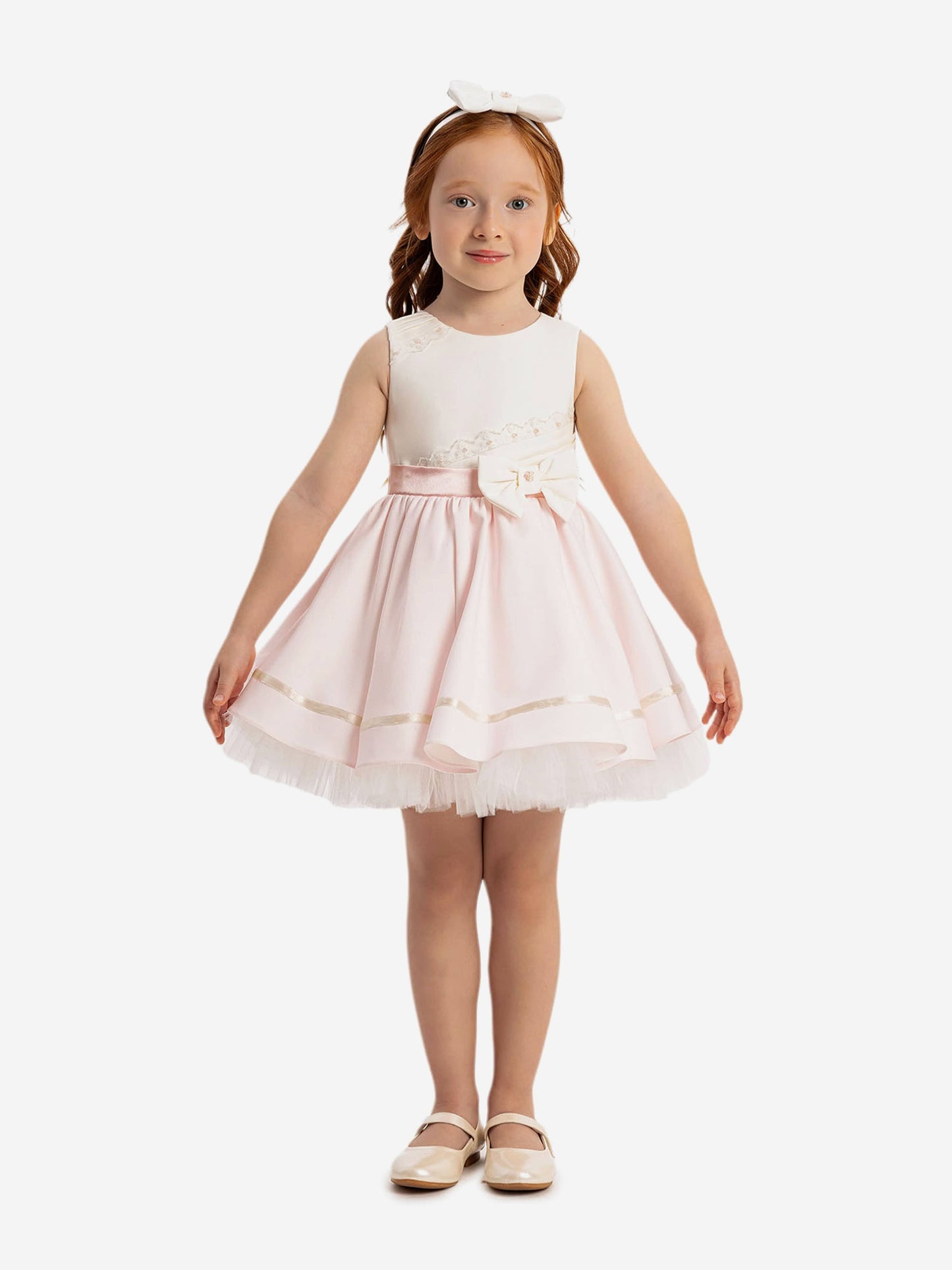 Pink baby girls dress with white lace bodice, tulle skirt and bow detail