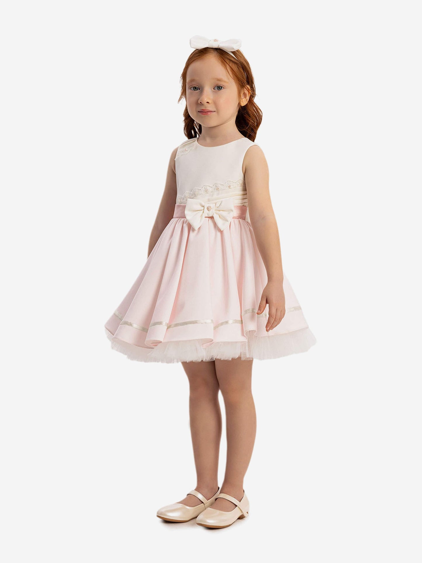 Pink twirl dress with lace bodice, satin bow waist and white headband