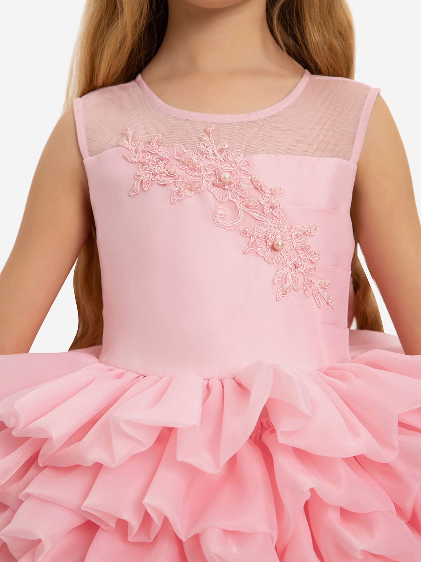 Pink sleeveless girls dress with sheer yoke and floral appliqué with pearls