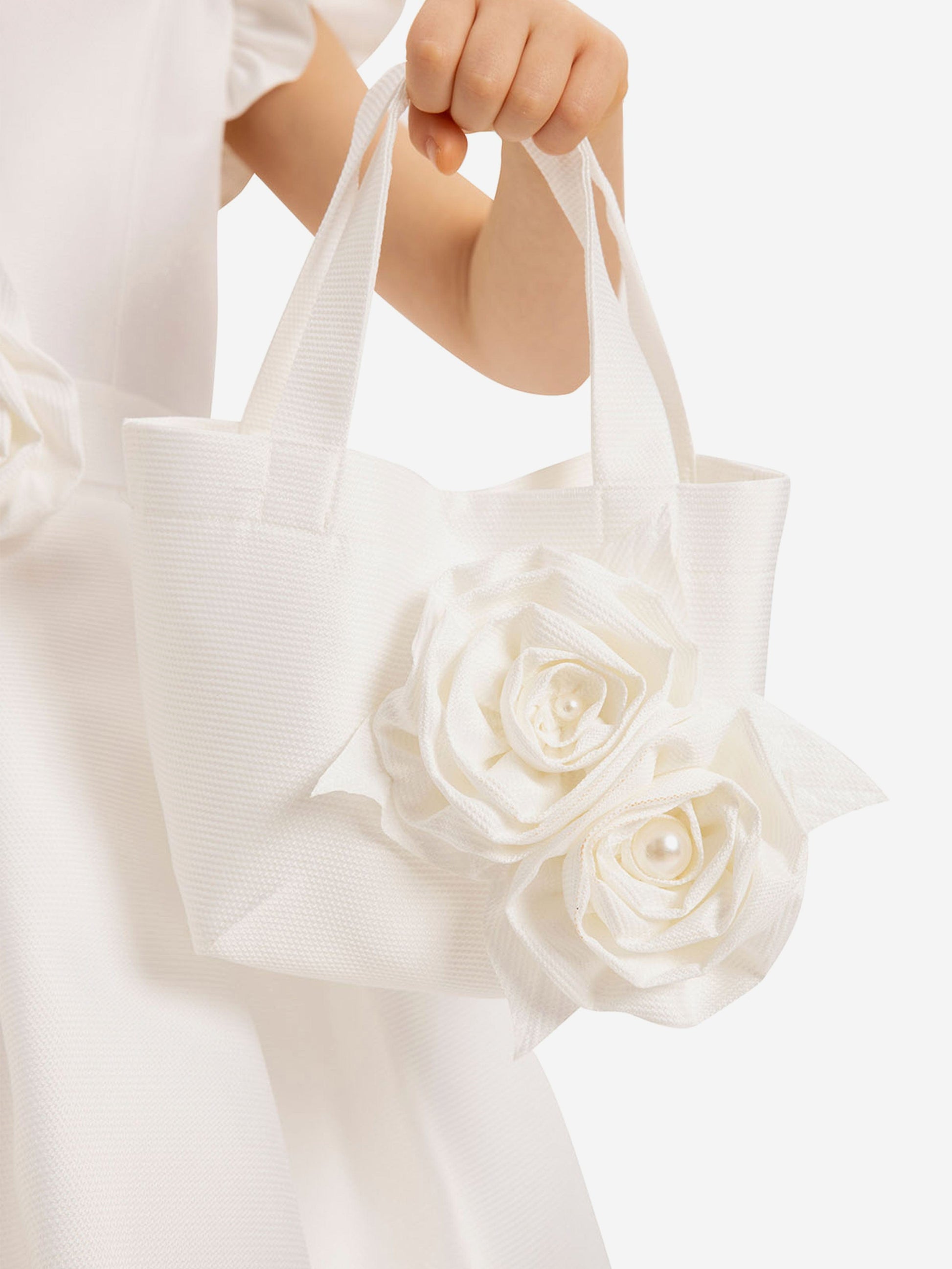 White floral tote bag with two rose appliqués and ribbon handles