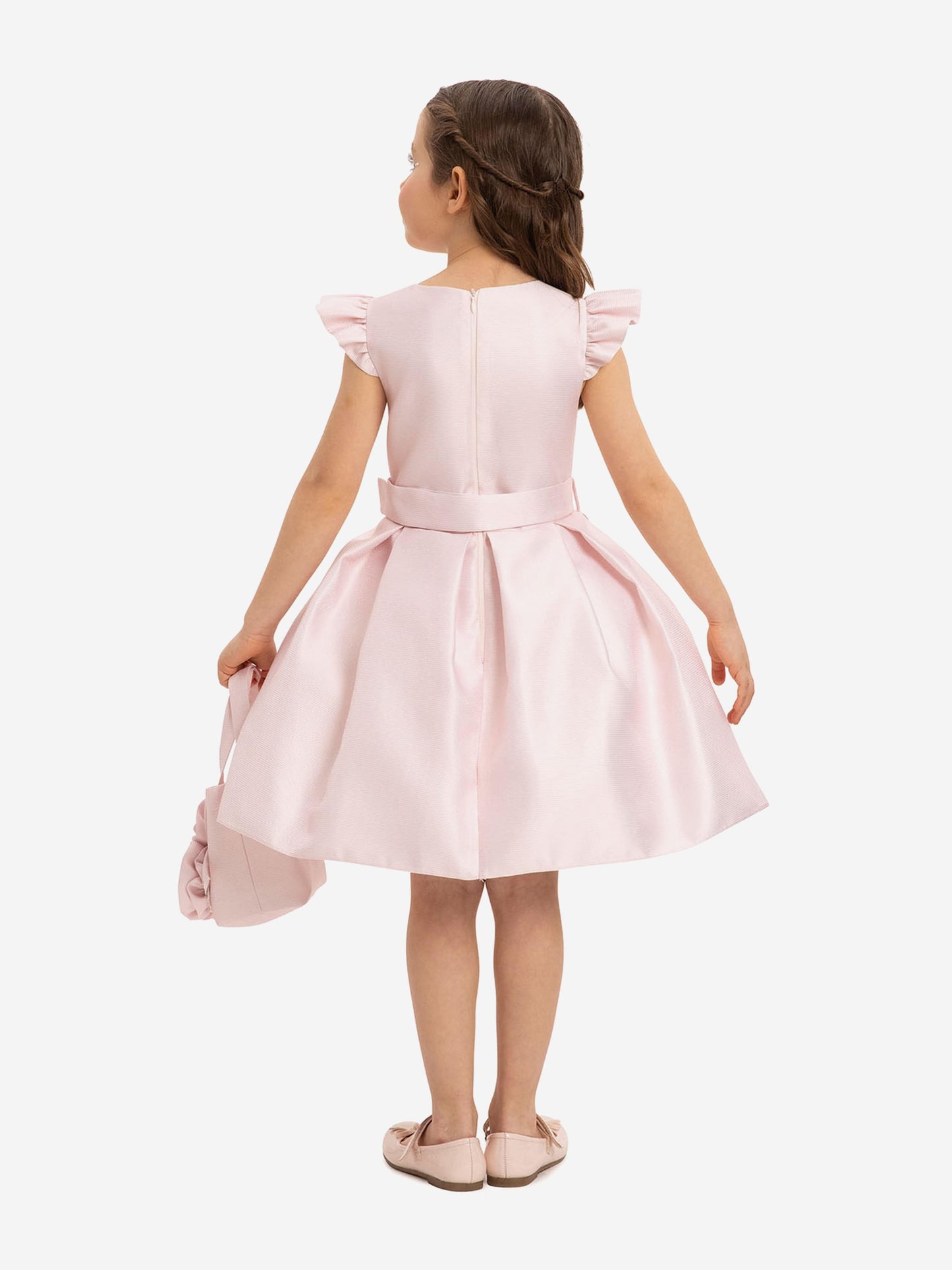 Pink girls’ dress back view with gathered waist and matching floral bag