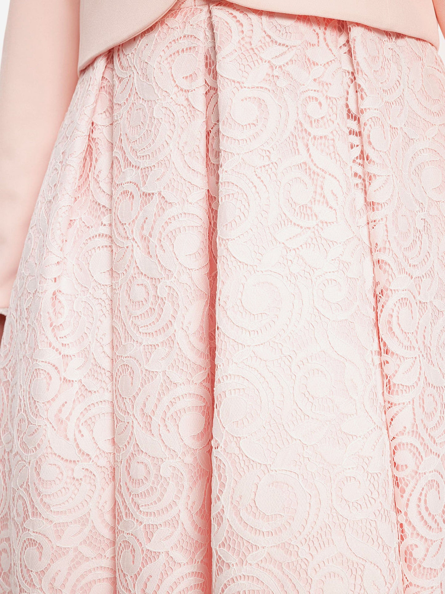 Pink lace skirt with vertical panel seams and scalloped floral texture