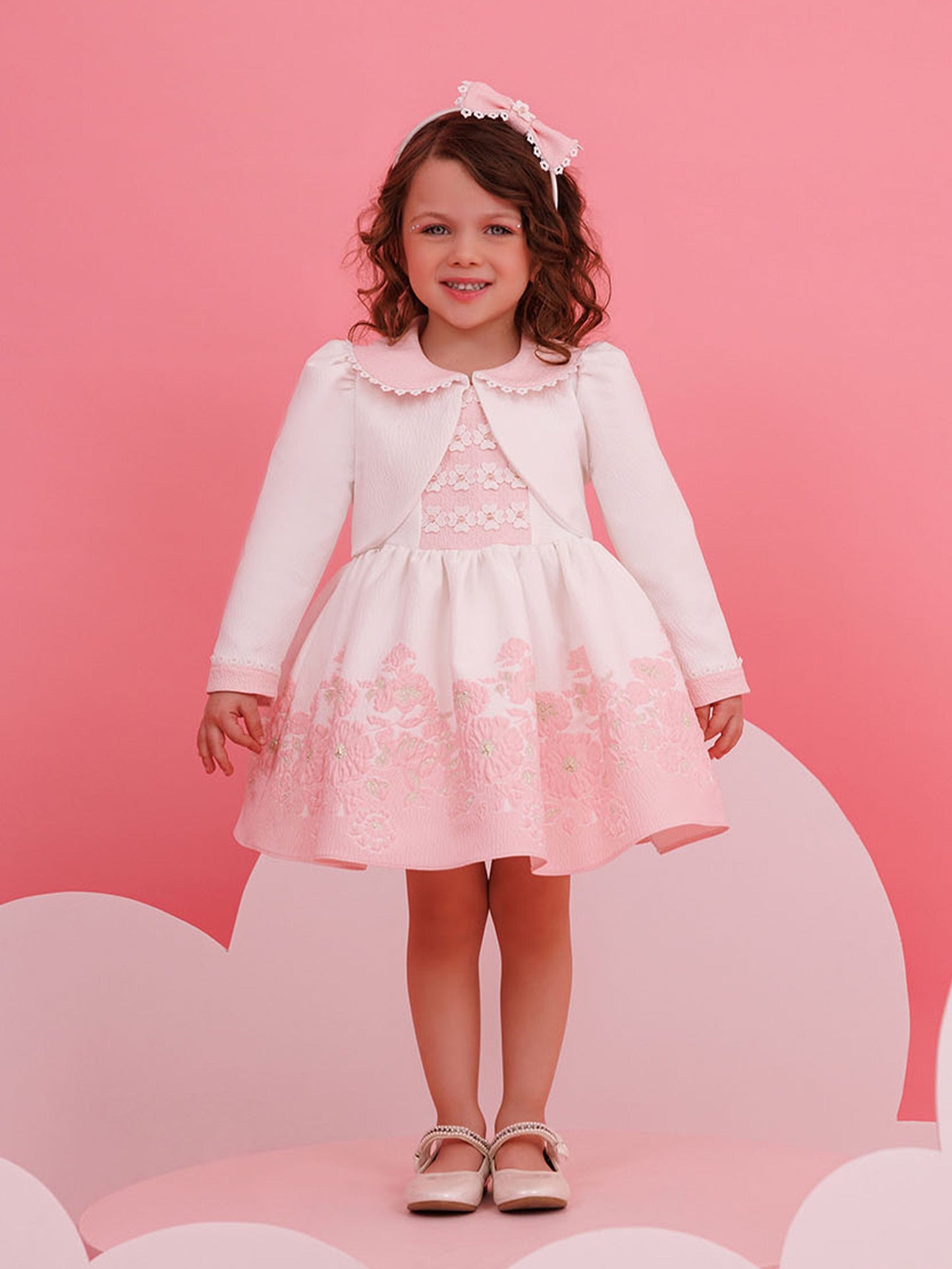 Pink baby dress with white bolero and floral yoke, bow headband included