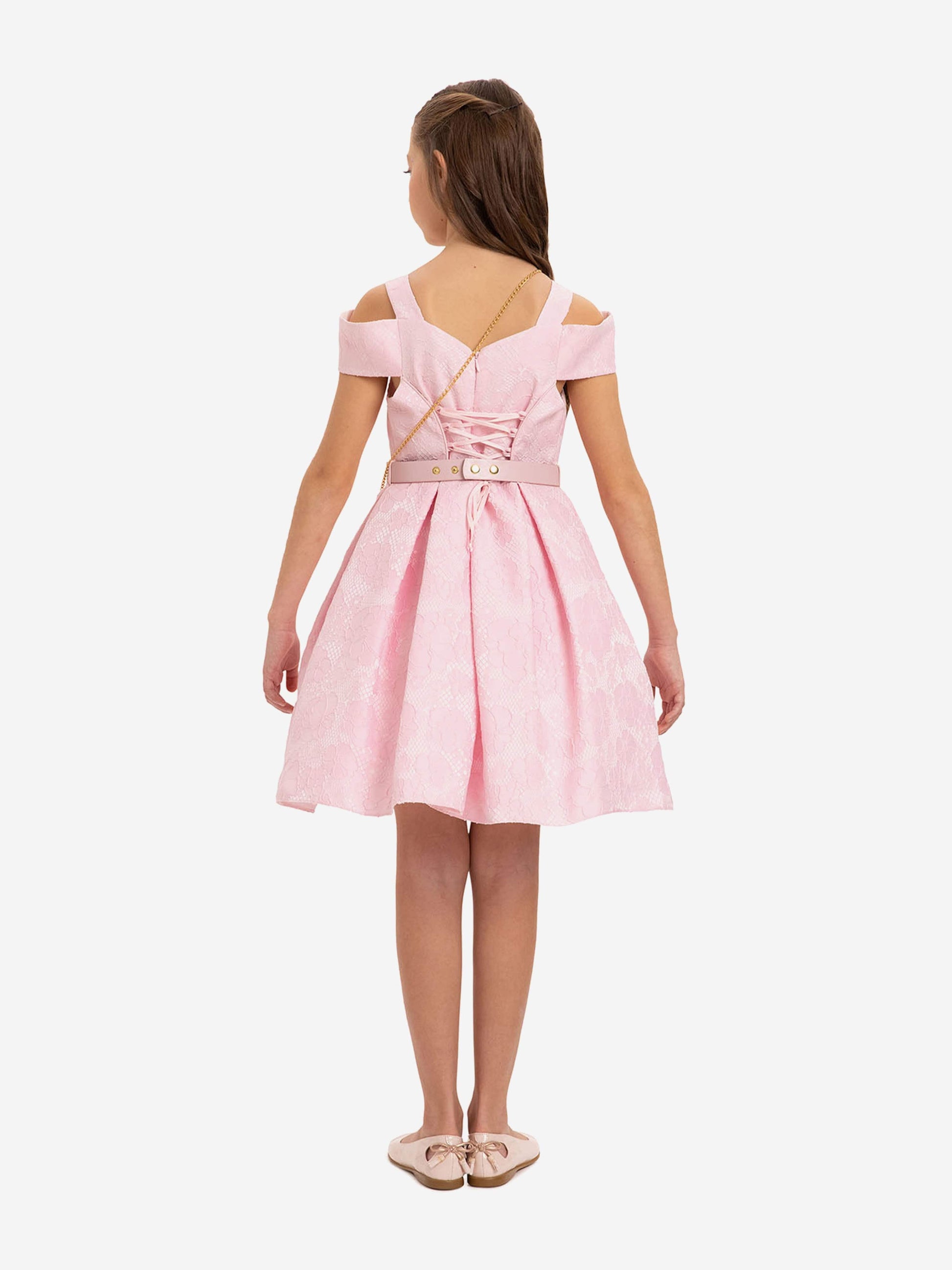 Girls pink dress back view with belt and crossbody bag strap