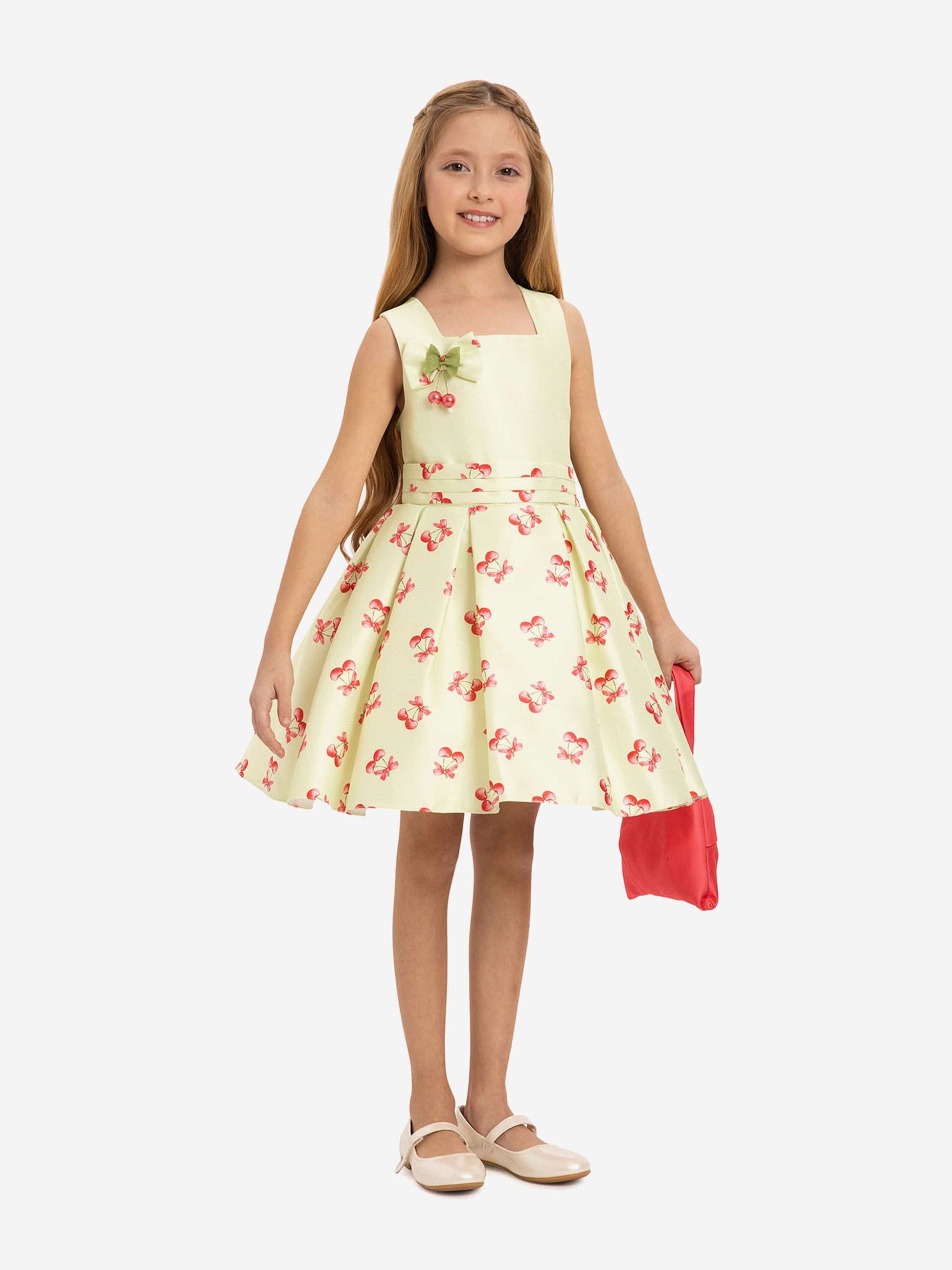 Girls pale green cherry print sleeveless dress with red bow and matching bag