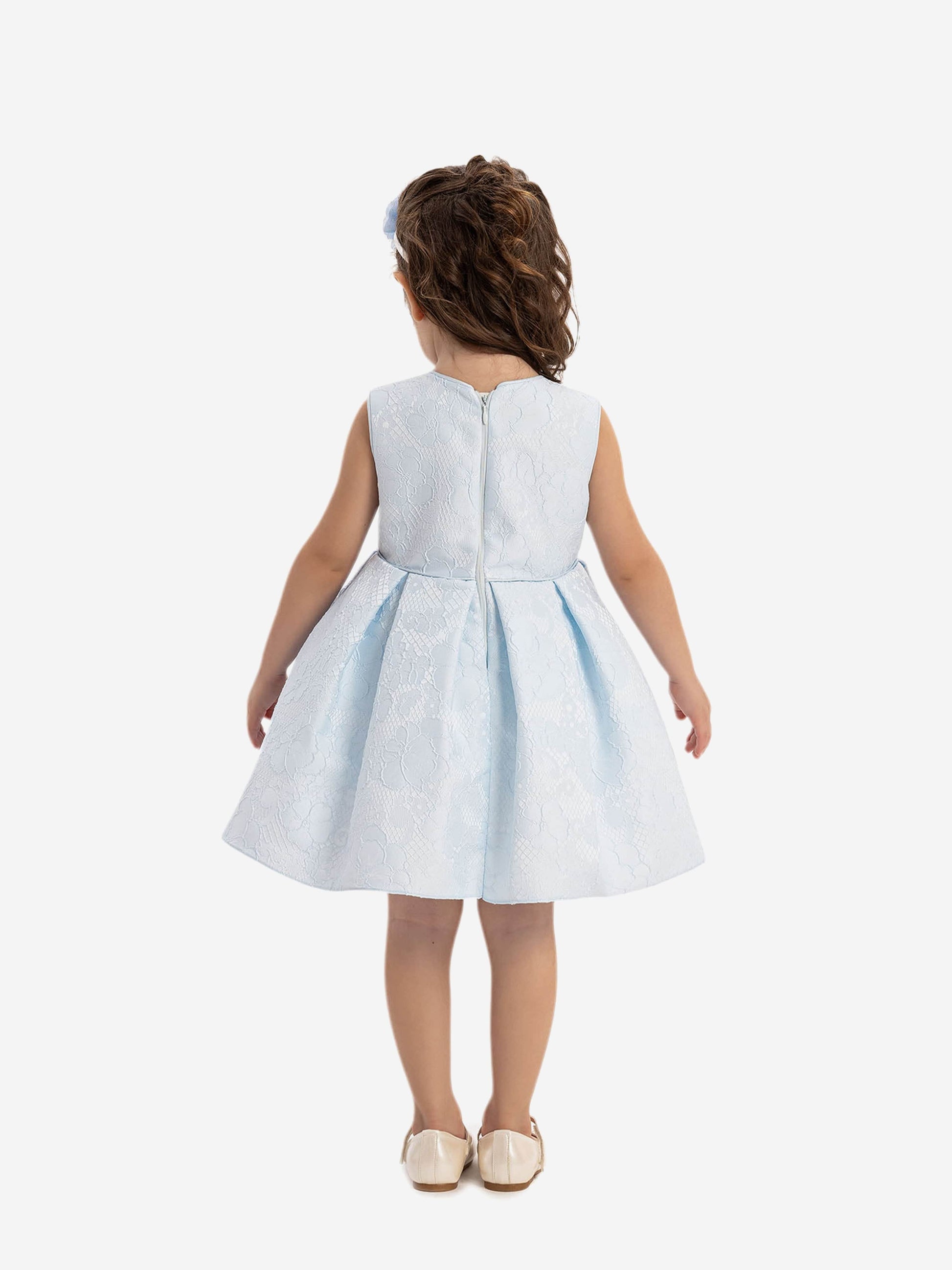 Back view of baby girl flower dress, white with light-blue pleated skirt