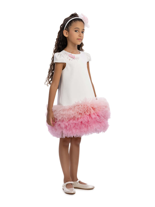 Ivory girls occasion dress with pink tulle ruffle hem and applique flower at chest