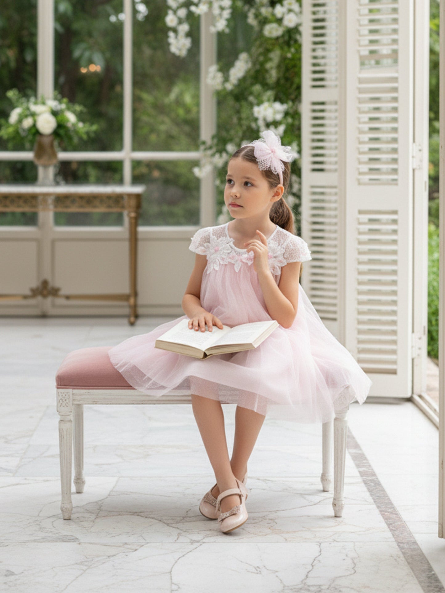 Pink occasion dress with lace applique neckline, short tulle sleeves, headband