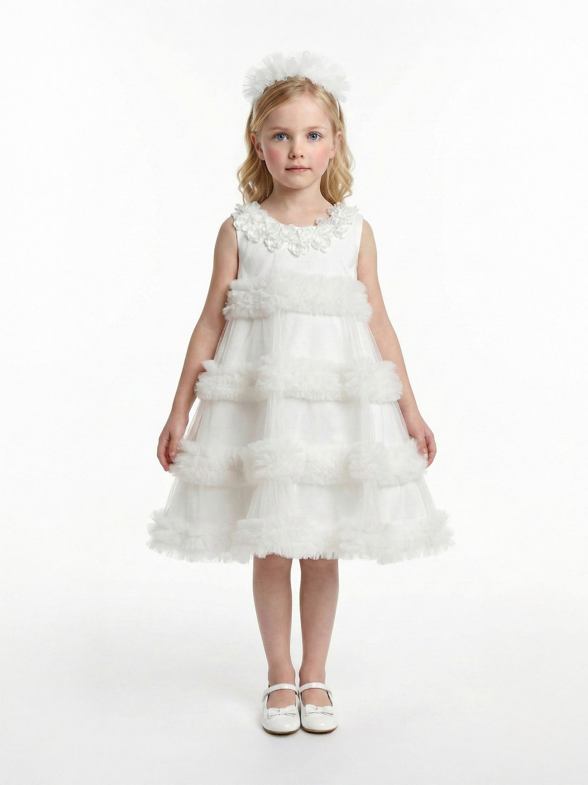 Ivory occasion dress with tiered tulle skirt and floral appliqué neckline