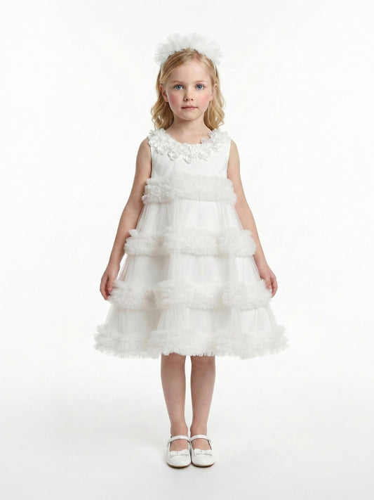 Ivory occasion dress with tiered tulle skirt and floral appliqué neckline
