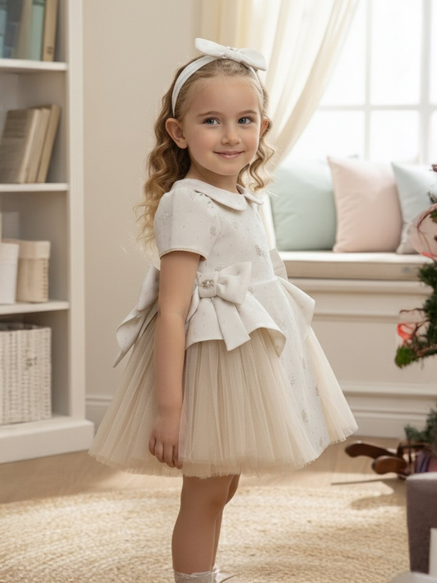 Ivory baby dress with bow waist detail and headband, full view
