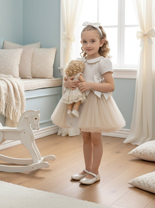 Ivory occasion dress with tulle skirt and matching headband