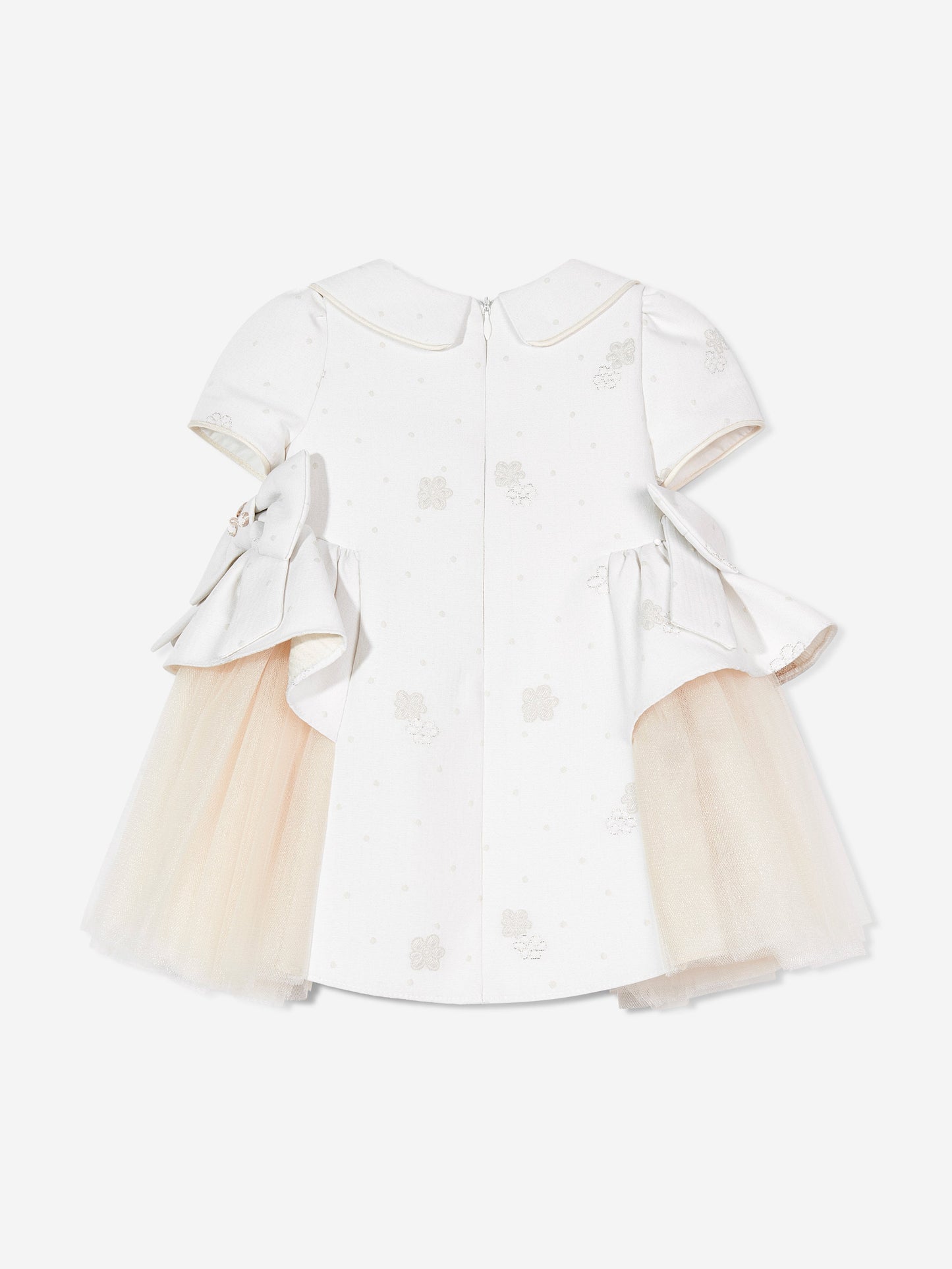 Ivory dress flat lay, back view with tulle skirt and bow accents