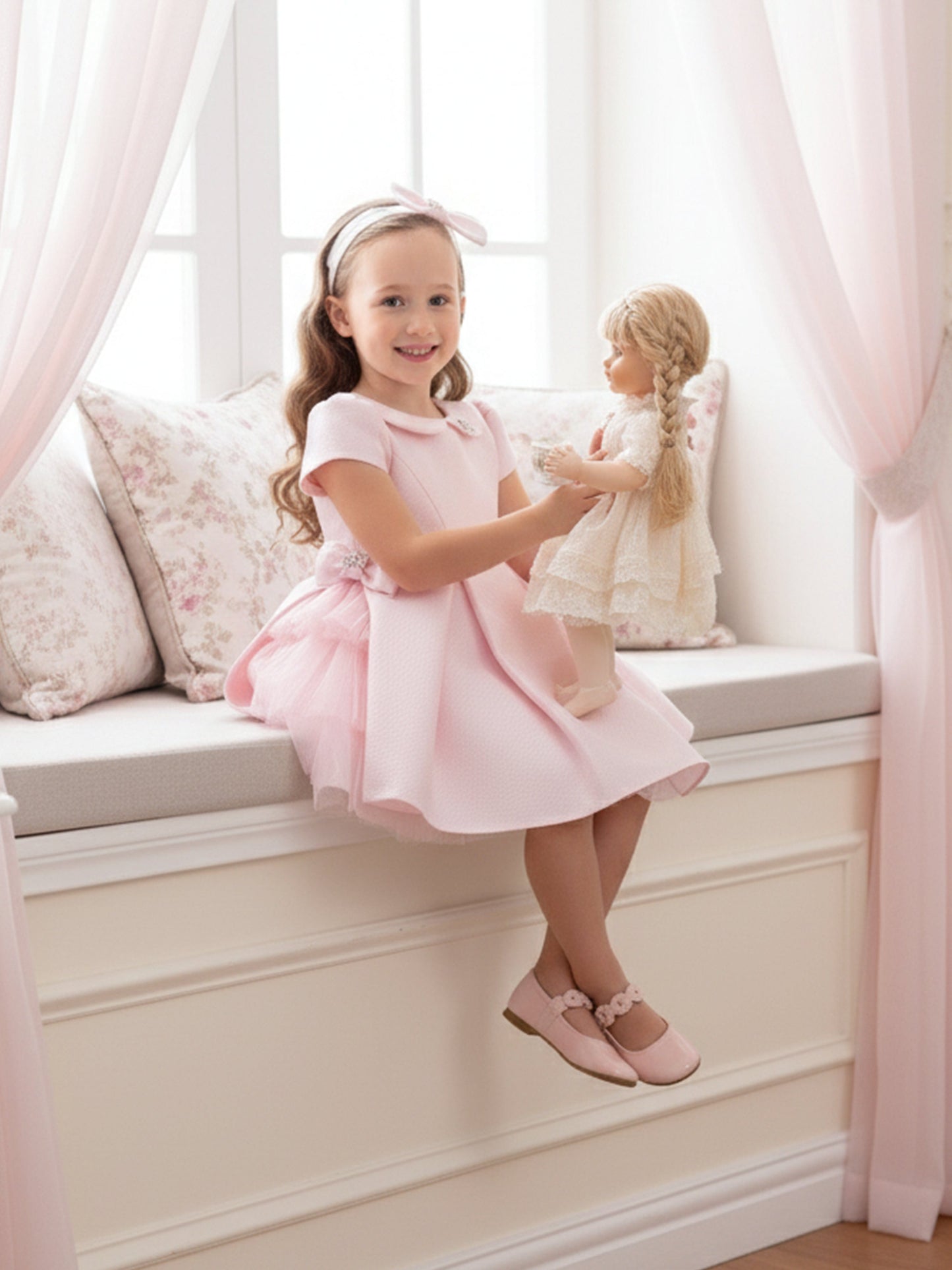 Pink occasion dress with headband, full skirt and short sleeves