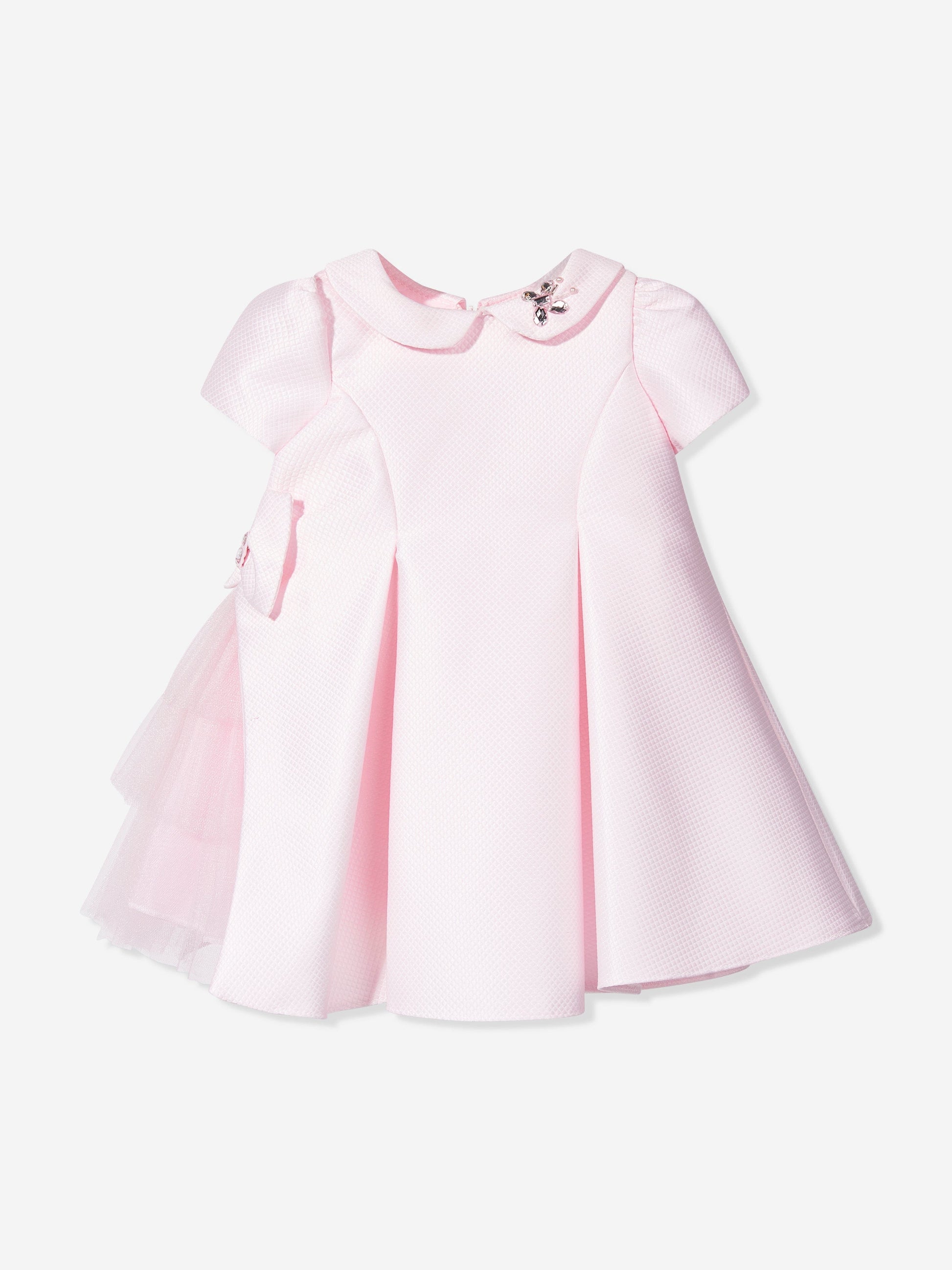 Pink baby occasion dress flat lay: textured fabric, pleated skirt and tulle