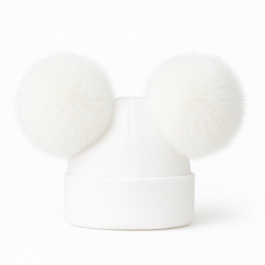 White knit double pom pom hat with two large fuzzy pom poms