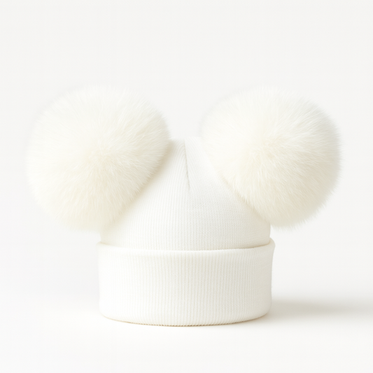 Cream knit pom pom hat with two large fluffy poms