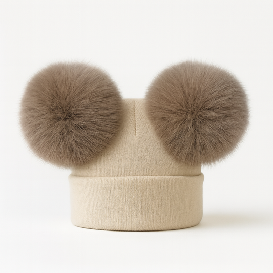 Double pom pom knit hat with two large fluffy cream-beige pom poms