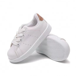 Girls gold sequin trainers with white upper and lace-up front, shiny sequin toe detail