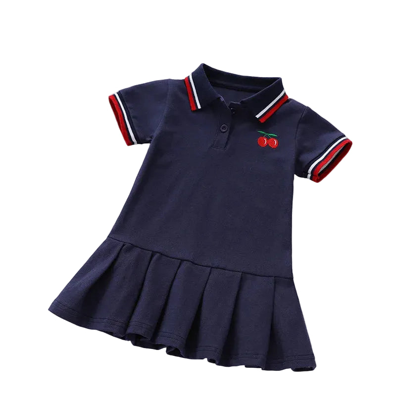 Girls navy polo dress with cherry emblem, button placket, and red striped collar