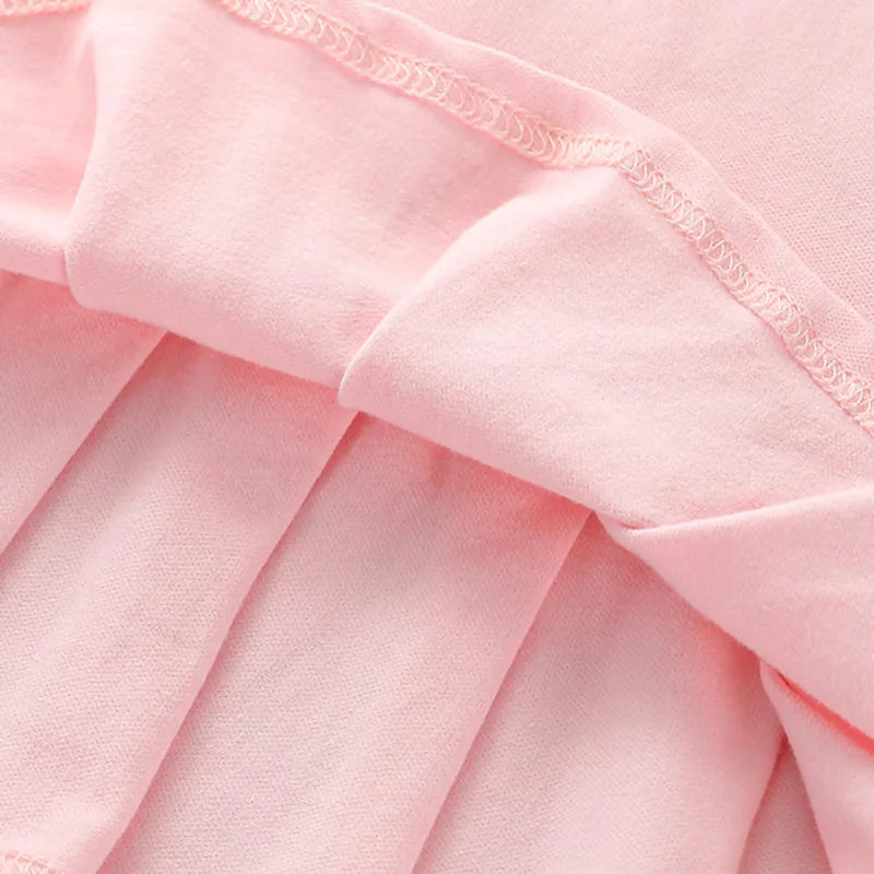 Soft pink polo dress skirt with gathered pleats and stitched hem