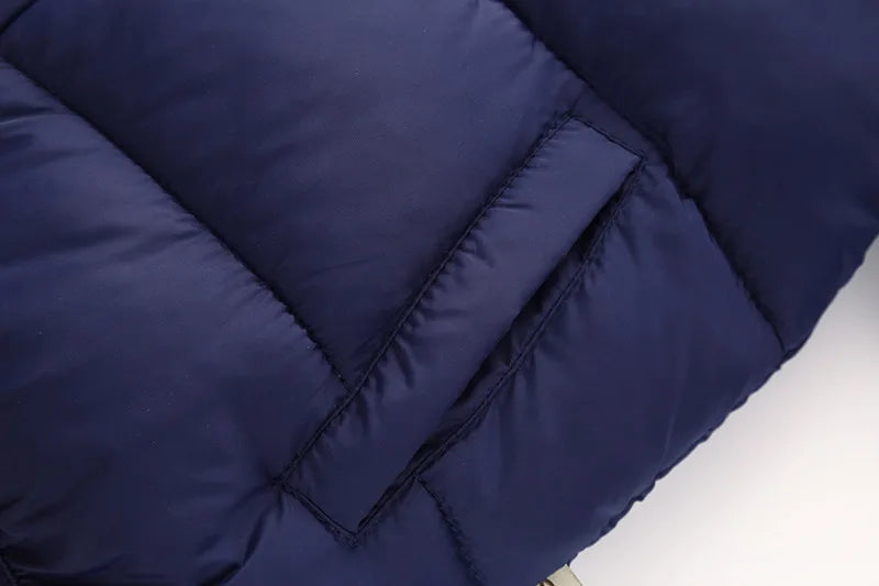 Dark blue kids puffer jacket, quilted outer shell and insulated seams